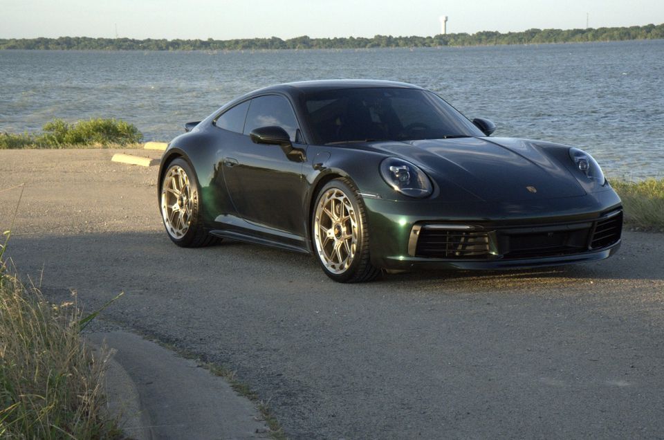 Nano Emerald Green 2023 Porsche 911 Carrera T on gold wheels